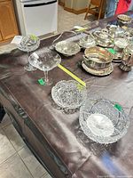 Group showing two footed compotes and two bowls on table