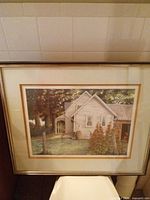 Full view of framed print showing image, mat and frame