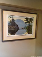 Full view of framed serigraph on wall