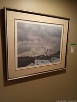 Framed print on wall showing full artwork and frame