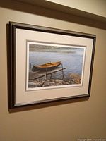 Full view of framed Robert Bateman print on wall