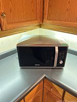 Front view of Samsung microwave on countertop