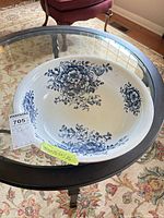 Top view of basin showing interior floral pattern and overall condition