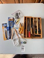 overview of all tools and wooden tray on table