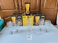 Strongbow boxed glasses and loose glasses displayed