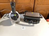 Yonanas dessert maker and Starfrit grill on table