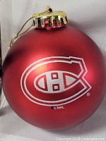 red ornament with Canadiens logo close-up