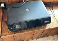 Top view of HP Envy 4500 printer with power cord attached