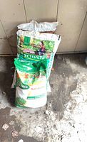 All three garden supply bags stacked
