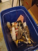 Assorted tools in blue tote