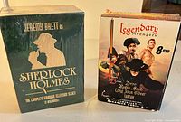 Both DVD box sets front view