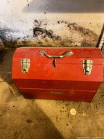 closed red toolbox front view with chrome latches