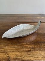 Top view of aluminum leaf bowl showing shape and texture