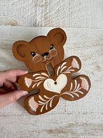 Front view of painted wooden teddy bear switch cover