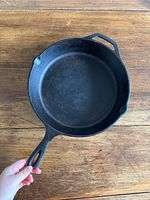 Top view of Lodge cast iron skillet showing interior and both handles