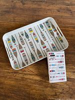 Tray and napkin pack together showing design