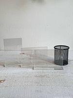 Three clear acrylic frames with black mesh pencil holder, full lot view