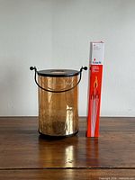 Lantern and matchbox side by side