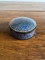 Lidded blue floral paper trinket box, full view