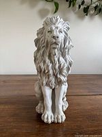 Front view of sitting lion statue