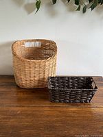 Front view of both baskets showing size and color difference
