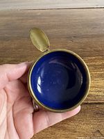 Ashtray interior showing cobalt enamel bowl