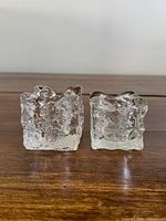Front view of both glass cube candle holders