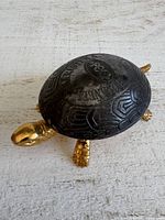 Top view showing embossed shell with BOJ branding and overall condition
