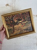 Front view of framed cabin landscape print