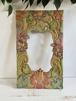 Full view of carved wood frame front