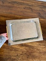 Full top view of rectangular stainless platter with handles