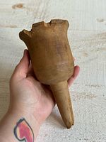 Wooden funnel front angle showing flared rim and spout