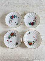 Top view of all four shell-shaped dishes