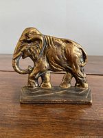 Front view of cast metal elephant bookend