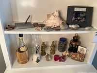 Overall view of both shelves showing most items