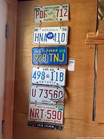 Group view of all seven plates mounted vertically