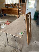 Overview of folding table and wooden dolly