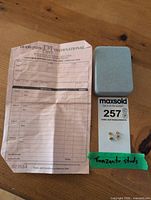 Invoice, case, earrings grouped