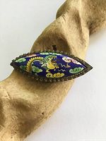 Front view showing painted dragon porcelain plaque and filigree frame