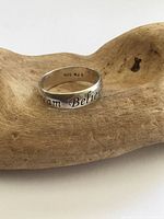 Exterior view of sterling silver band showing engraving