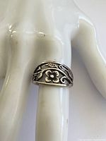 Front view showing floral cutout design