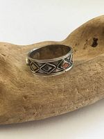 Full view of the sterling silver band showing geometric inlay pattern