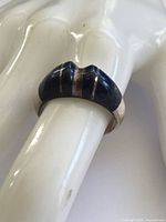 Front view showing lapis inset and silver separators