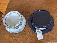 Dansk bowls over plates beside stack of IKEA 365+ plates
