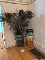 overview of both vases with feathers