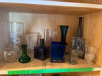 Shelf with all nine glass pieces in place
