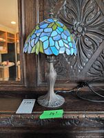 Full view of lamp showing shade, base and cord