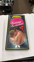 Closed box showing game title Fantasy Romance and cover art