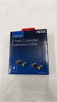 Front of retail box showing product name, compatibility, and image of two cables