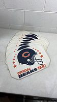 Stack of placemats front view showing Chicago Bears helmet graphic